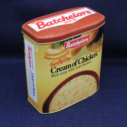 Batchelors Cream of Chicken soup tin on a dark blue background
