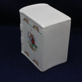 Little cartoon rabbits on a white money box