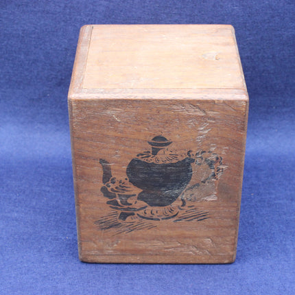 Wooden box with a decorative design on a blue background