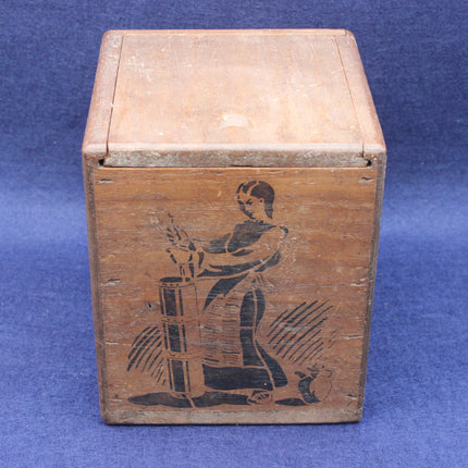 Wooden box with a printed design of a person and a horse on a blue background