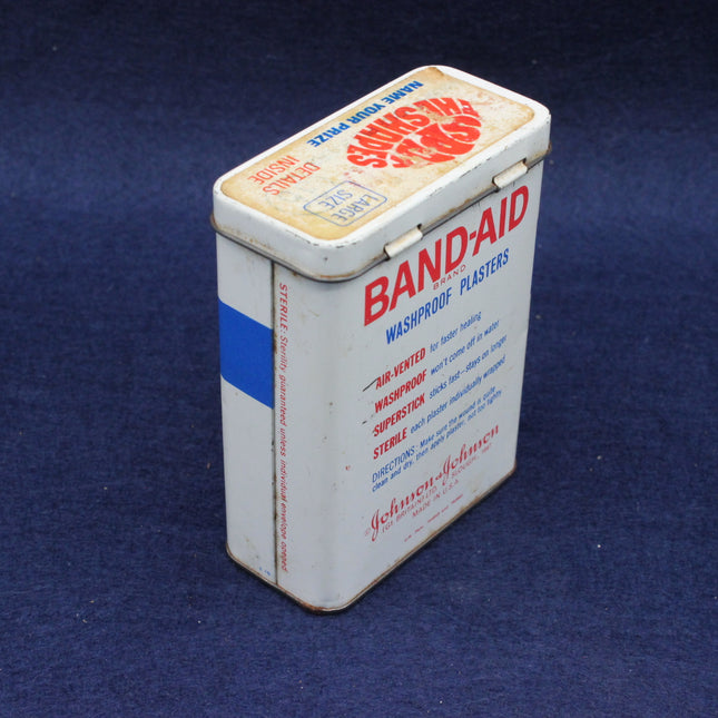Rear of band aid tin