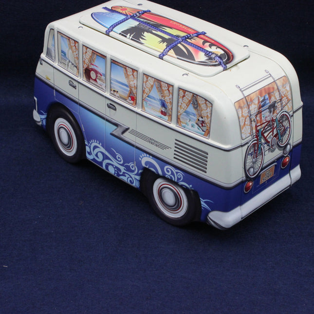 Decorative model of a vintage van with colorful graphics on a dark blue background