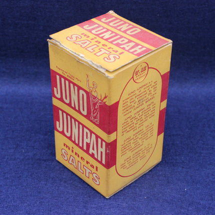 Vintage box of Juno Junipah mineral salts on a blue background