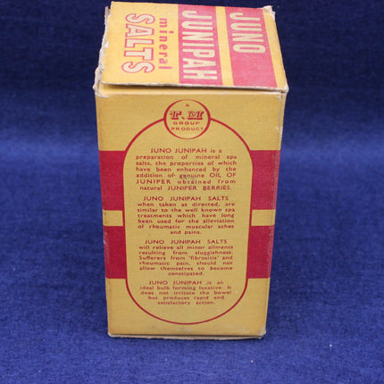 Vintage Juno Junipah mineral salts packaging on a blue background