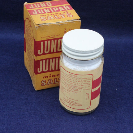 Juno Junipah mineral salts bottle and packaging on a blue background