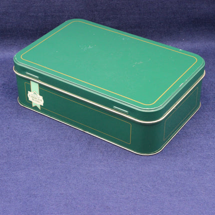 Dark green tin with gold accent lines and Brooke Bond Tea Branding
