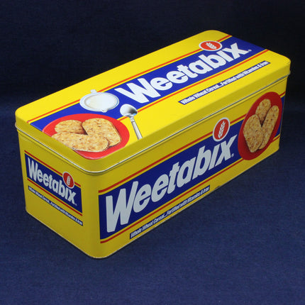 Yellow and blue Weetabix cereal box on a dark blue background