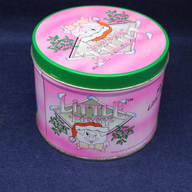 Pink tin can with cartoon pig design on a blue background