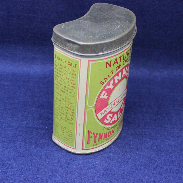 Vintage Fynnon salt container with a blue background