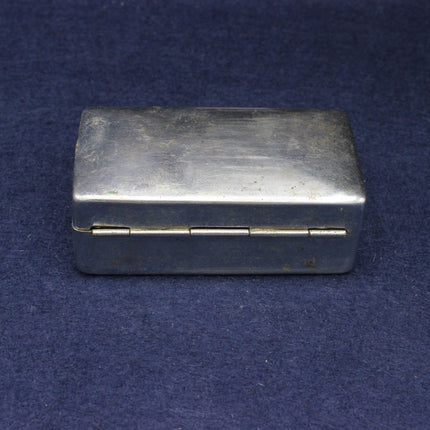 Silver rectangular box on a blue background