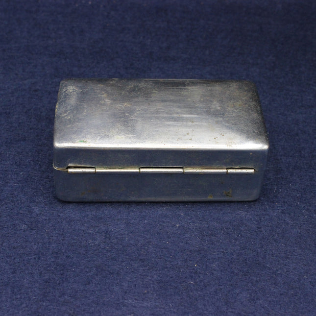 Silver rectangular box on a blue background