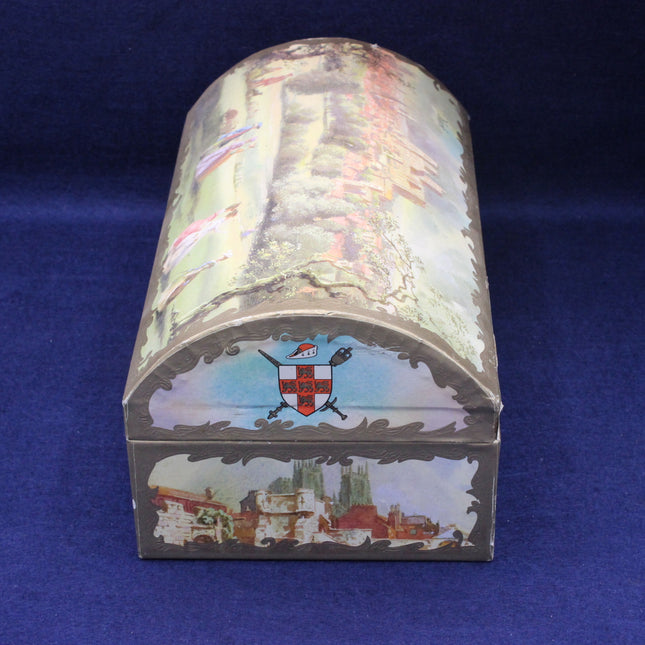 Decorative box with castle design on a blue background