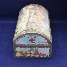 Decorative box with castle design on a blue background