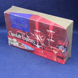 Box of Terry's assorted chocolate liqueurs on a blue background
