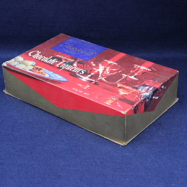 Chocolate liqueur box with a red and blue design on a blue background