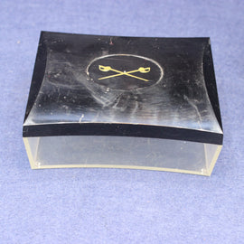 Black and clear rectangular box with a logo on a blue background