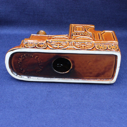 Decorative vintage-style money box bottom on a blue background
