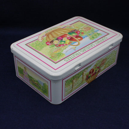 Decorative tin box with colorful illustrations on a dark background