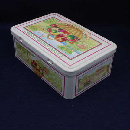 Decorative metal box with colorful design on a dark background