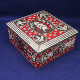 Decorative box with red and black pattern on a blue background