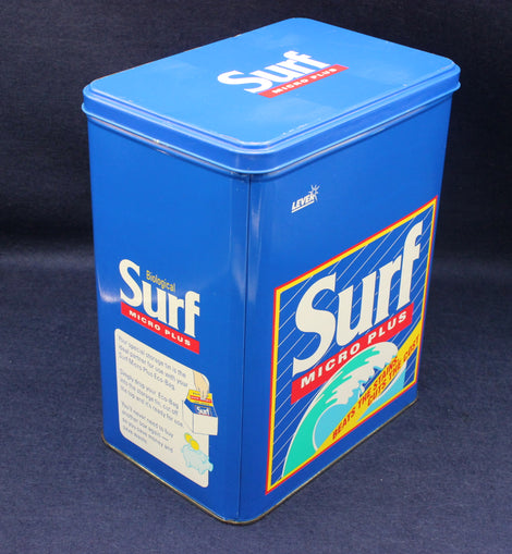 Blue surf product container with branding on a dark background