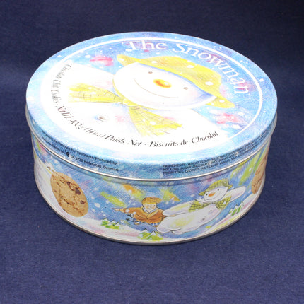Round tin with 'The Snowman' illustration on a blue background