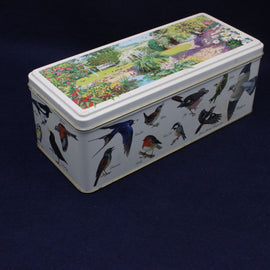 Rectangular tin box with bird illustrations on a dark background