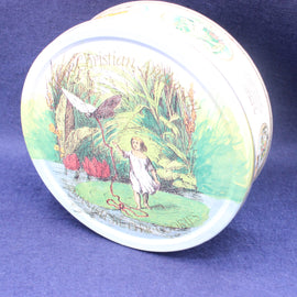 Round tin with a colorful illustration of a girl and butterfly on a purple background