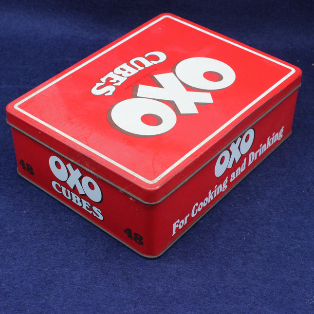 Red OXO tin box on a blue background