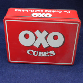 Red OXO Cubes tin on a blue background