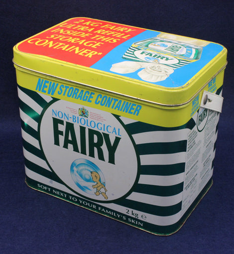 Vintage Fairy non-biological cleaning powder storage container on a dark blue background