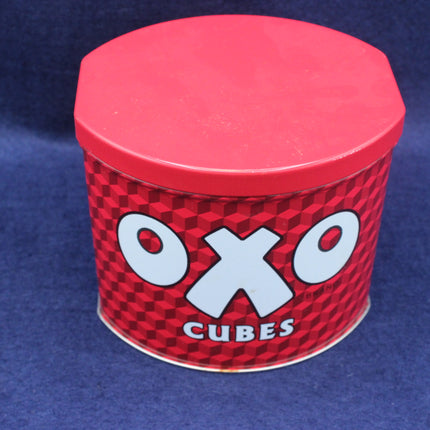Red canister with 'OXO Cubes' logo on a blue background