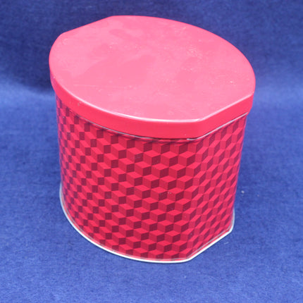 Red hexagonal container with a checkered pattern on a blue background