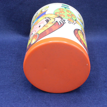 Cylindrical container with colorful design on a blue background