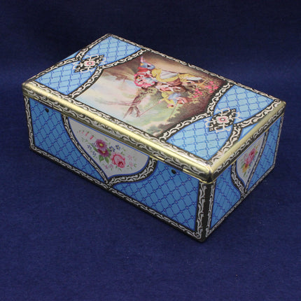 Decorative biscuit  box with intricate design on a blue background