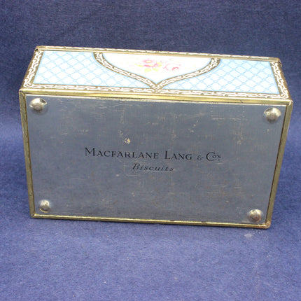 Decorative box with 'MacFarlane Lang & Co' branding on a blue background