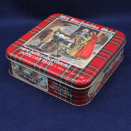 Pure butter shortbread tartan tin on a blue background