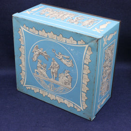 Decorative  antique biscuit tin blue box with white angelic designs on a dark blue background