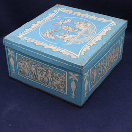 Decorative blue box with white angel designs on a dark blue background