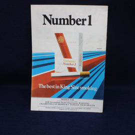Vintage cigarette pack with 'Number 1' branding on a dark background