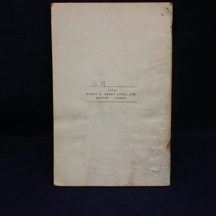 Vintage document with text and a logo on a dark background