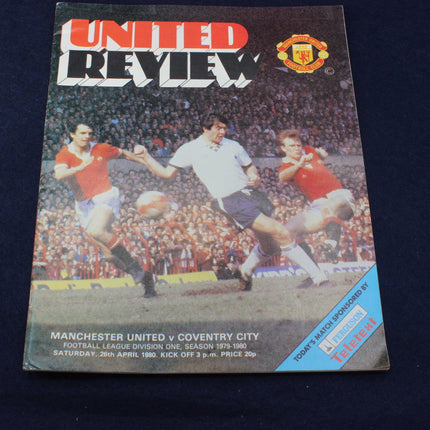 Manchester United vs Coventry City football match program cover with players and stadium.