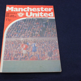 Manchester United football programme from a match against Nottingham Forest on a dark blue background
