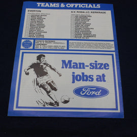 Soccer program with team and officials list, Ford advertisement, and player illustration on a dark background