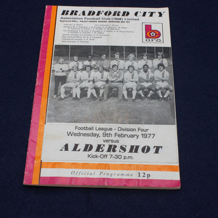 Football match programme for Bradford City vs Aldershot, featuring a team photo and event details.