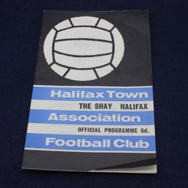 Vintage football club programme with Halifax Town logo on a dark background