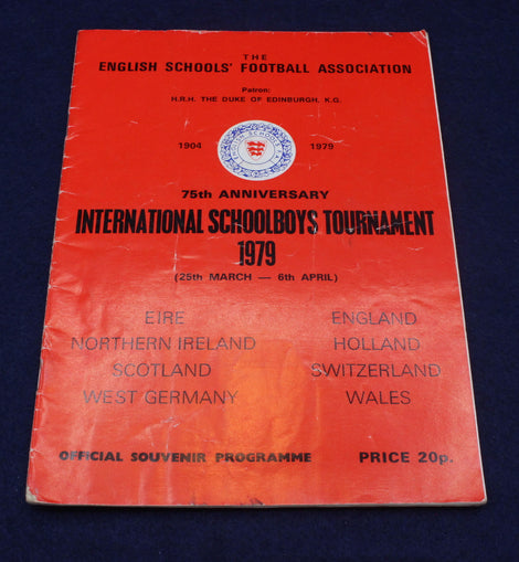 Red programme cover for the 75th Anniversary International Schoolboys Tournament 1979 on a dark blue background