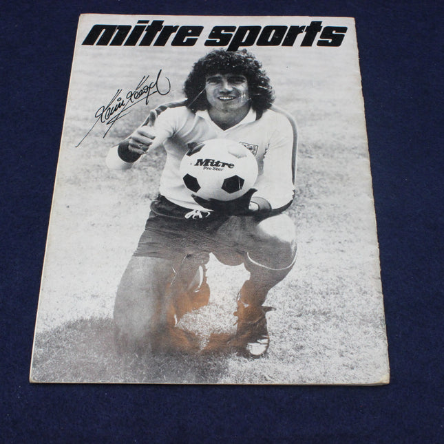 Vintage Mitre Sports promotional poster with a soccer player holding a ball on a dark blue background