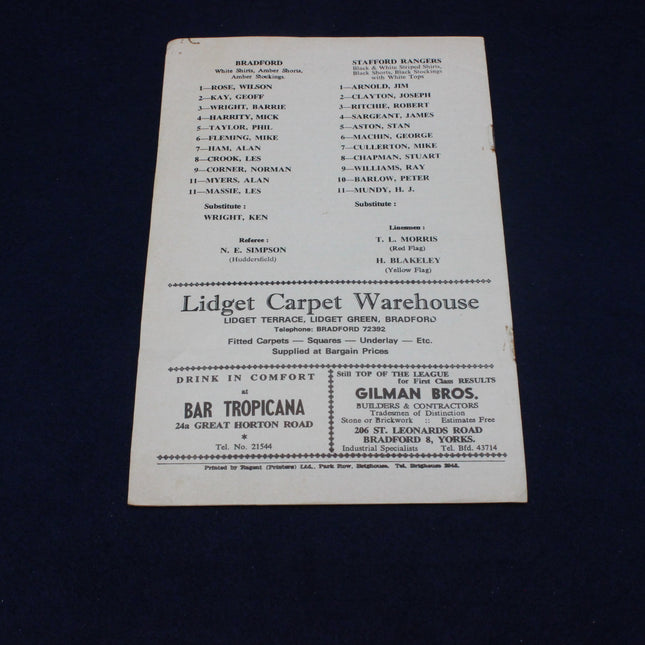 Vintage program with text and advertisements on a dark background