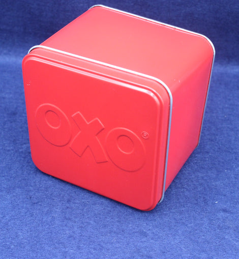 Red OXO tin box on a blue background